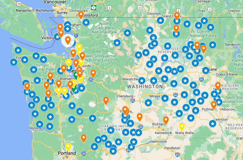 Map of Washington with blue markers indicating locations of EPA Priority School Districts. Additional markers indicate school districts with anywhere from one to five operating electric school buses
